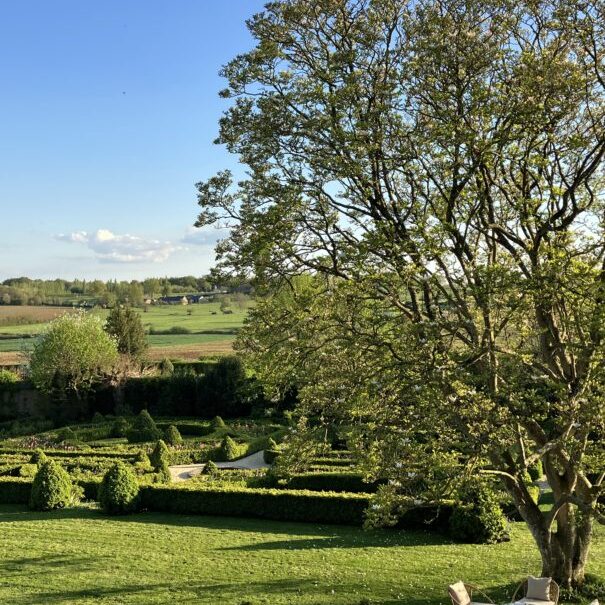 The large lawn, the French garden and the countryside